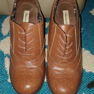 Gently used brown American Eagle clog boots